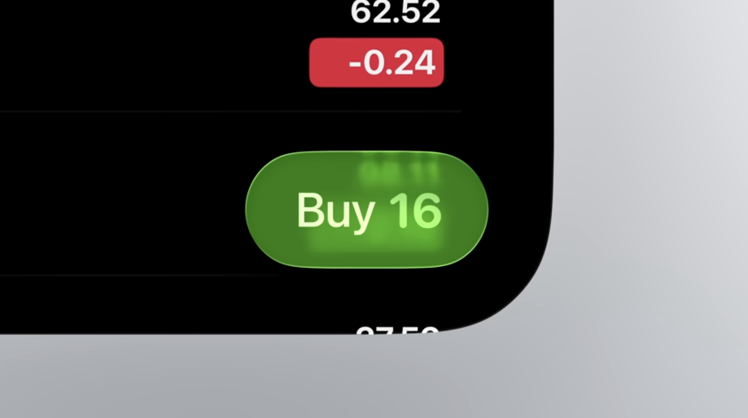 Auto-generated description: A green button labeled Buy 16 is displayed on a screen with some numerical values above it.